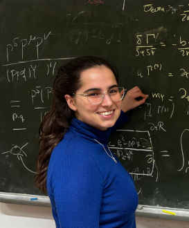 Picture showing a person in front of a blackboard